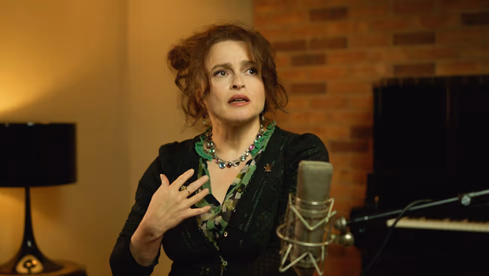 Helena Bonham Carter talking in front of microphone
